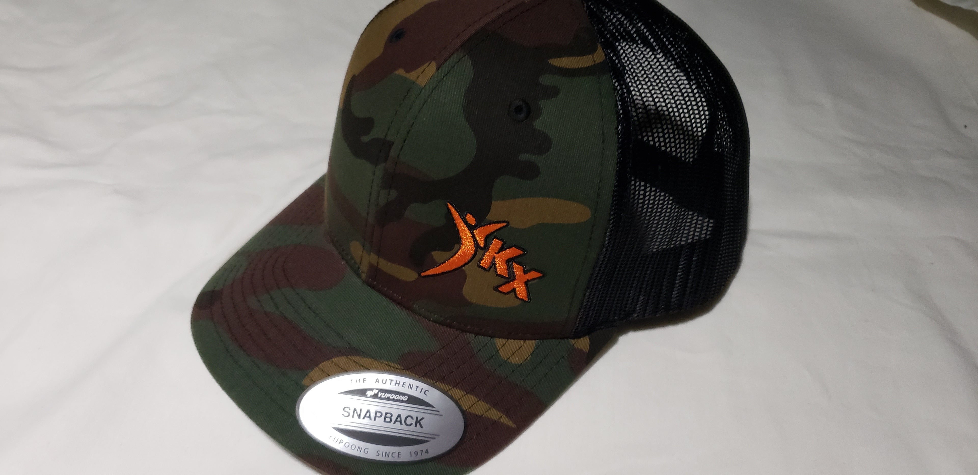 Kx Camo Snapback with Orange logo